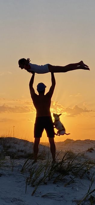 my dad lifting me up in sunset